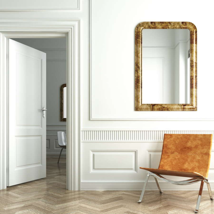 Classic white interior witn chair mirrors and open door